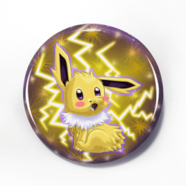 A cute chibi drawing by Camie M. Anderson of Jolteon from Pokemon on a handmade button
