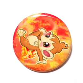 A cute chibi version of Chimchar from Pokemon drawn by Camie M. Anderson on a handmade button