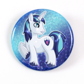 A cute chibi drawing by Camie M. Anderson of Shining Armor from My Little pony on a handmade button