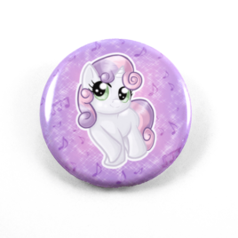 A cute chibi drawing by Camie M. Anderson of Sweetie Belle from My Little pony on a handmade button