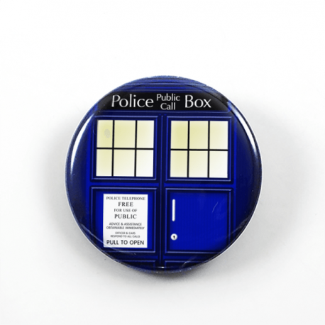 A drawing by Camie M. Anderson of the TARDIS from Doctor Who on a handmade button