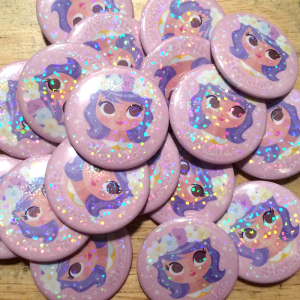 1.5" Holographic Pins made for Gabby Zapata. http://gabbyzapata.etsy.com/