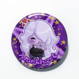 A cute chibi drawing by Camie M. Anderson of Amethyst from Steven Universe on a handcrafted button