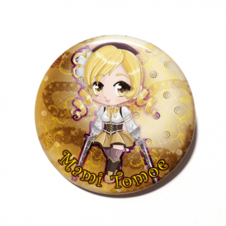 A cute chibi version of Mami Tomoe from Puella Magi Madoka Magica drawn by Camie M. Anderson on a handmade button